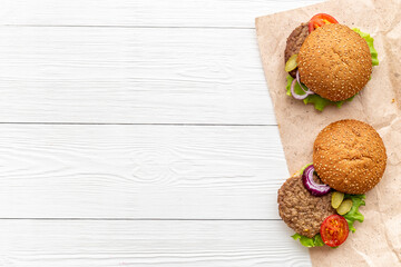 Top view of sandwiches with chicken burger and sliced onion