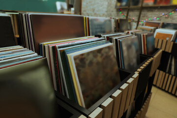 Rack with different vinyl records in store