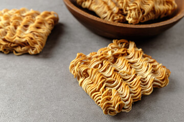 Crispy snack sprinkled with spice powder on ramen noodles