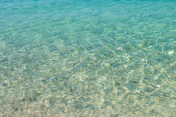The rippling sea with a crystal view of its bottom.