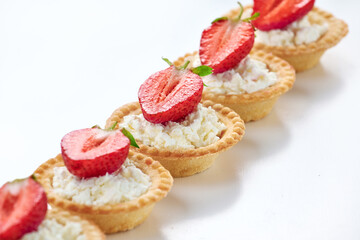 Close up tartlet with cottage cheese and strawberry