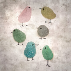 stylish textured old paper background with funny little penguins made of sea glass pebble pieces 