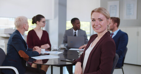 Group of business people having discussion in conference room