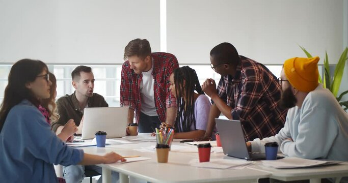 Designer team brainstorming and planning at meeting