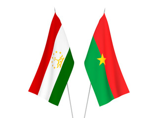 National fabric flags of Tajikistan and Burkina Faso isolated on white background. 3d rendering illustration.