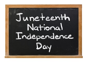 Obraz premium Juneteenth National Independence Day written in white chalk on a black chalkboard isolated on white