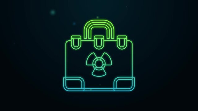 Glowing neon line Radiation nuclear suitcase icon isolated on black background. 4K Video motion graphic animation