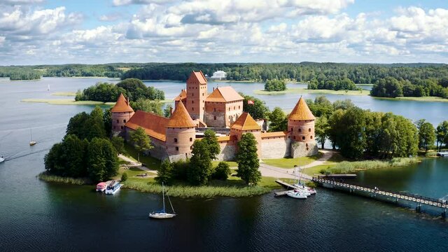 TRAKAI ISLAND CASTLE, TRAKAI, LITHUANIA. Aerial footage of Trakai Castle on an island in Lake Galvė. 