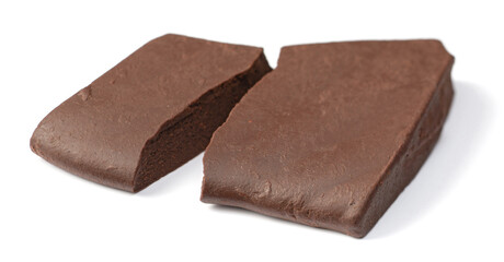 pure cocoa liquor (cocoa paste) isolated on white background