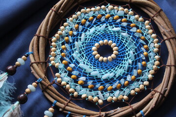 A beautiful dream catcher with natural stones.