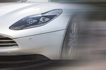 silver sports car with blur effect