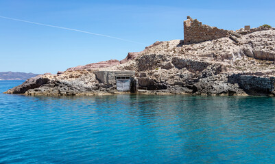 Old wooden door for boats, Firopotamos, Milos island, Cyclades, Greece