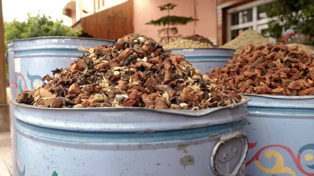 Traditional Moroccan herbal tea mixture in a street market in Marrakech, Morocco. Tea mixture with herbs and spices, and roots.
