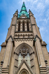 Fototapeta na wymiar Colonial clock and bell tower of the Saint James Cathedral in Toronto, Canada