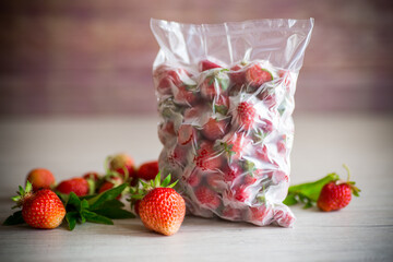 frozen fresh strawberries in a vacuum bag