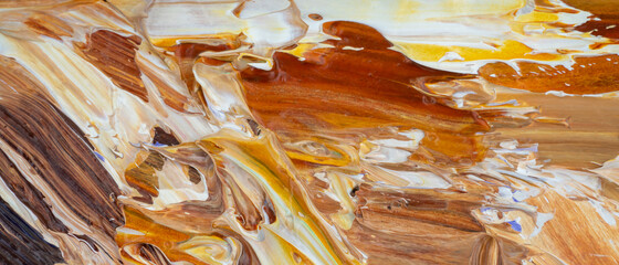 Embossed pasty oil paints and reliefs. Primary colors: ocher, white, yellow.  Abstract art.