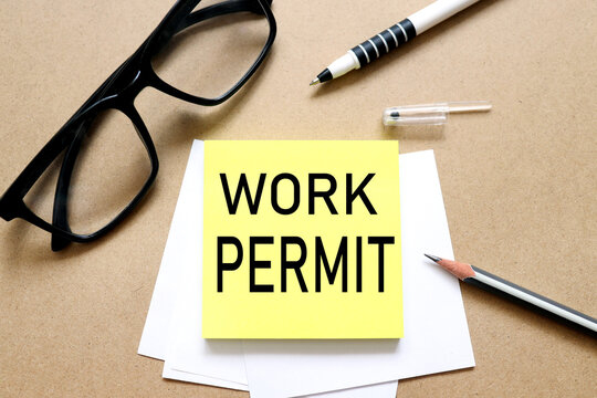 Work permit. the inscription on the business card is attached to the notebook.