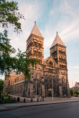 Fototapeta na wymiar The medieval cathedral lit by the sunset in Lund Sweden during summer