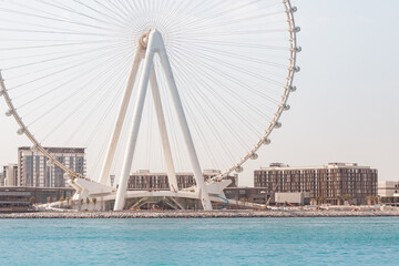 Obraz premium One of the largest Ferris Wheels in the World is the Dubai Ain on bluewaters island. Top tourist attractions in the United Arab Emirates