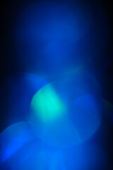 Abstract defocused lights on dark background