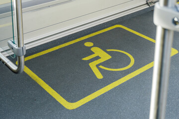 Symbol of reserved space on a bus for wheelchair passengers