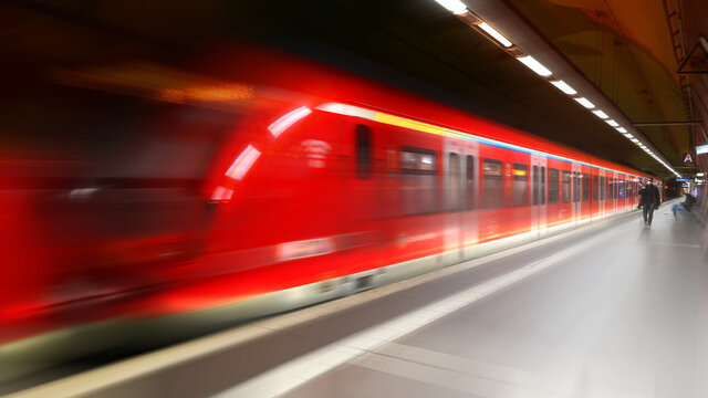 In subway underground fast moving motion railroad train at night
