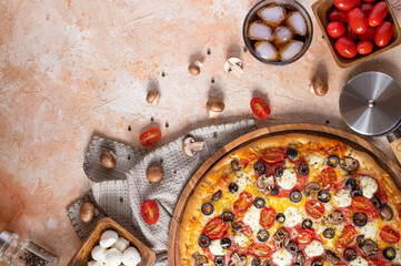 In the lower right corner of the photo, we see a piece of pizza. There are many ingredients spread around the pizza. White napkin and light background. High angle view.
