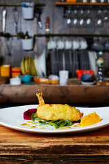 Kiev cutlet on a plate on the background of the kitchen