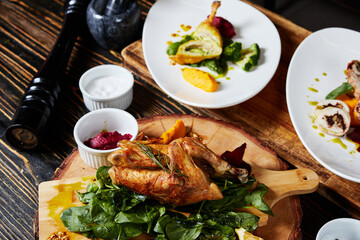 fried chicken Kiev cutlet and roll on a brown table