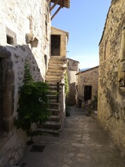 Fototapeta na wymiar narrow street in the old town of island country