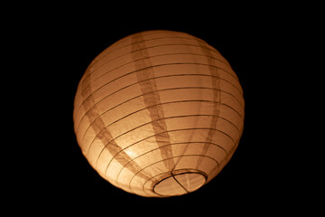 Chinese lamp on a black background.