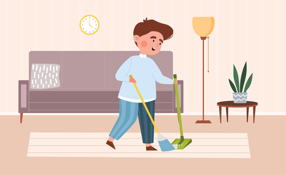 Little boy sweeping the floor