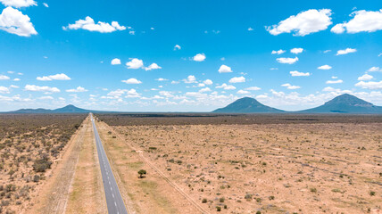 Africa adventure travel, drone flight in a Botswana road