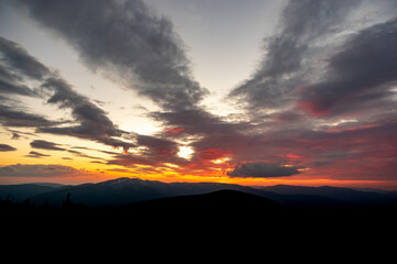 Beautiful colorful panorama of the sunset in the Carpathian mountains