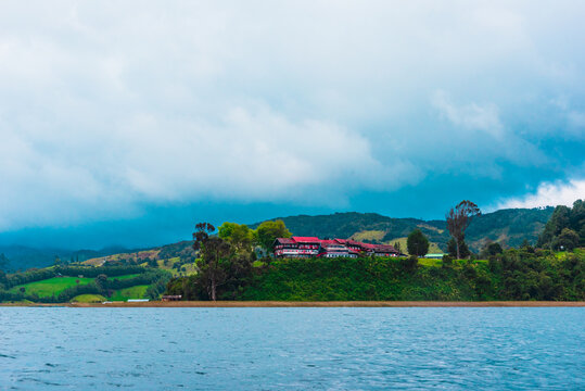 landscape of lake, house and montains in the Cocha Lake,