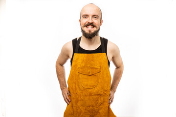 The man poses in a photo studio.
