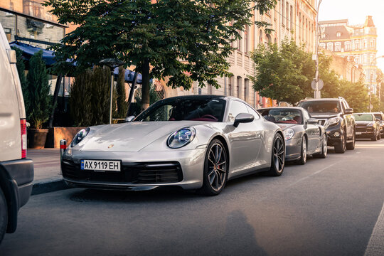 New Porsche 911 Carrera S 992 and old classic Porsche 911 Turbo 992. Kyiv, Ukraine - June 2021.