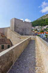 Fortified wall of medieval town Dubrovnik. Croatia. Dubrovnik on Adriatic Sea is one of most prominent tourist destinations, UNESCO World Heritage Site.
