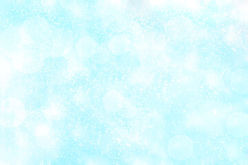 Blue and white bokeh snowfall background.  Christmas, New Year and all celebration backgrounds concept. 