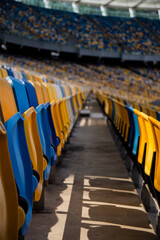 Naklejka premium Empty rows of seats in a football olympic stadium