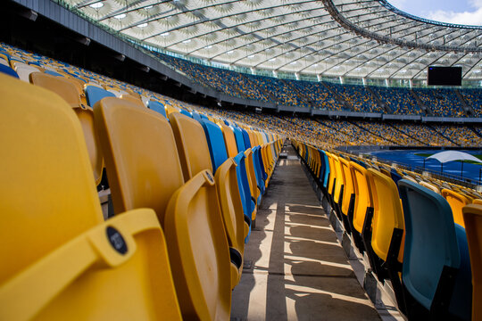 Empty Rows Of Seats In A Football Olympic Stadium