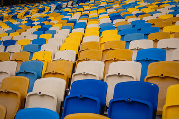 Fototapeta premium Empty rows of seats in a football olympic stadium
