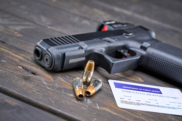 concealed carry permit with handgun and self-defense bullets - obrazy, fototapety, plakaty