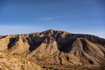 Cliff Faces of Guadalupe Mountains Under A Blue Sky