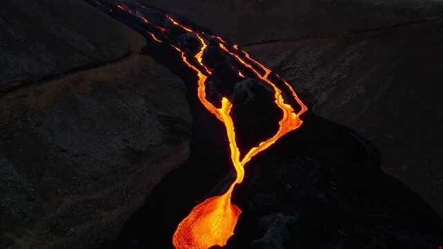 Aerial over lava rivers blocking hiking path Iceland eruption 2021