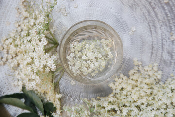 A glass of elderflower juice.	