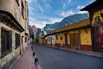 View of graffiti homes in Bogota, Colombia. Wide angle street view.