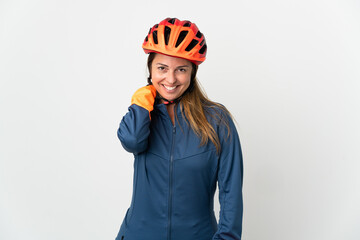 Middle age cyclist woman isolated on white background laughing