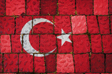 National flag of Turkey on stone  wall background. Flag  banner on  stone texture background.