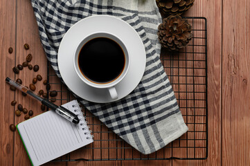 cup of coffee on a wooden table